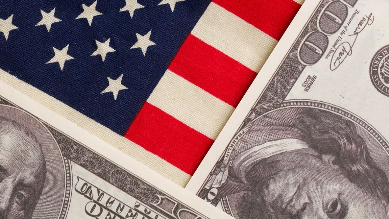 US Dollar And Flag